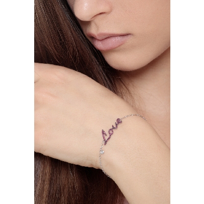 18k white gold bracelet with Love in rubies and diamond solitaire 