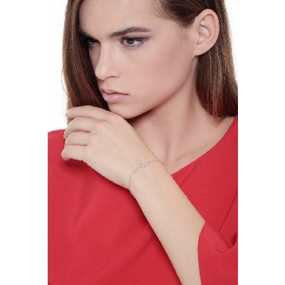 White gold 18k bracelet with diamond heart and diamond solitaire