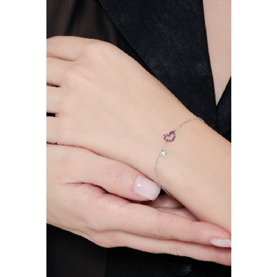 18k white gold bracelet with heart charm with rubies