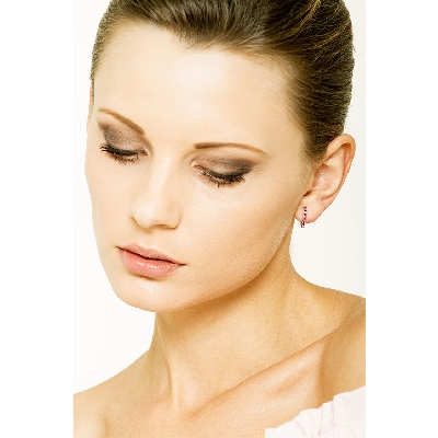 18k white gold oval earrings with rubies