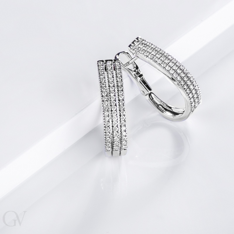 White gold 18k oval earrings with three diamonds rows