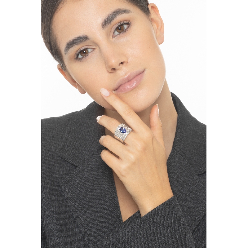 18k white gold band ring with tanzanite and 7 rows of diamonds