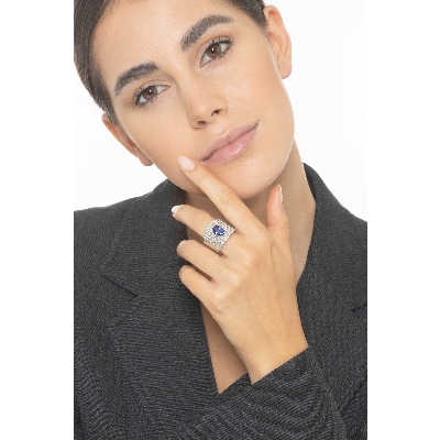 18k white gold band ring with tanzanite and 7 rows of diamonds