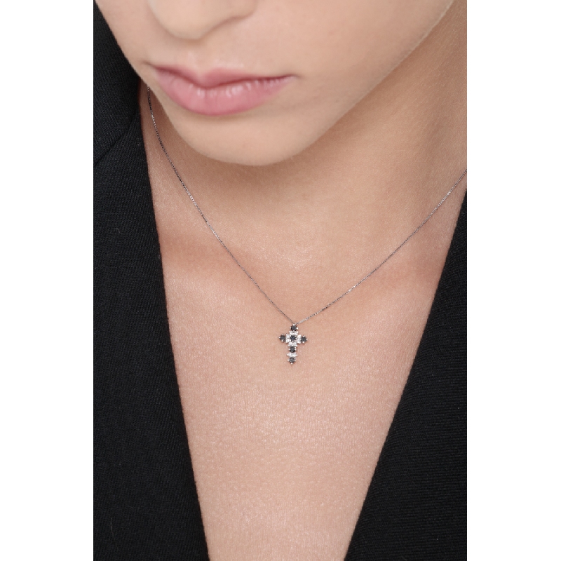 Cross pendant with black and white diamonds