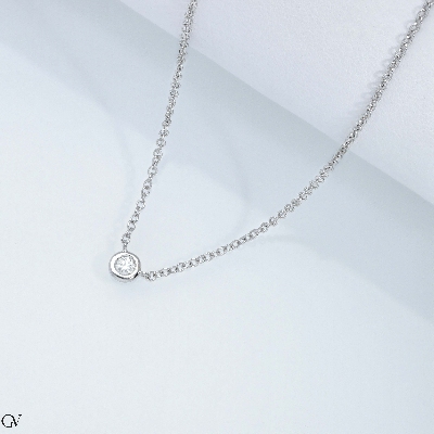 Solitaire round cut diamond necklace in 18k white gold