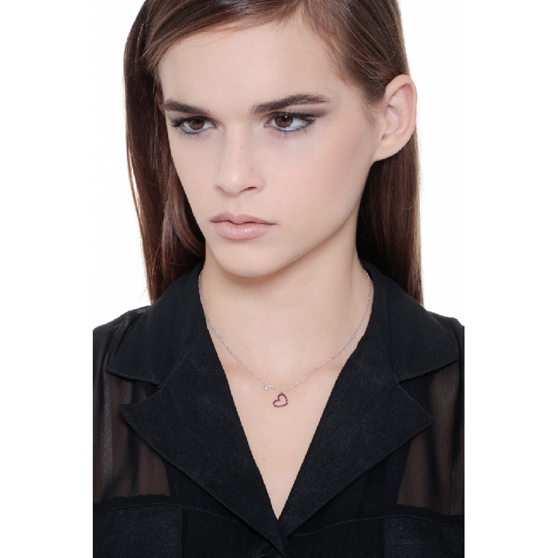 Necklace with burnished heart pendant with rubies and a solitaire diamond