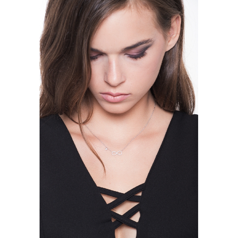 18k white gold infinity pendant with diamonds