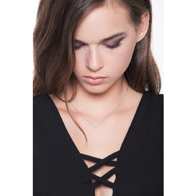 18k white gold infinity pendant with diamonds