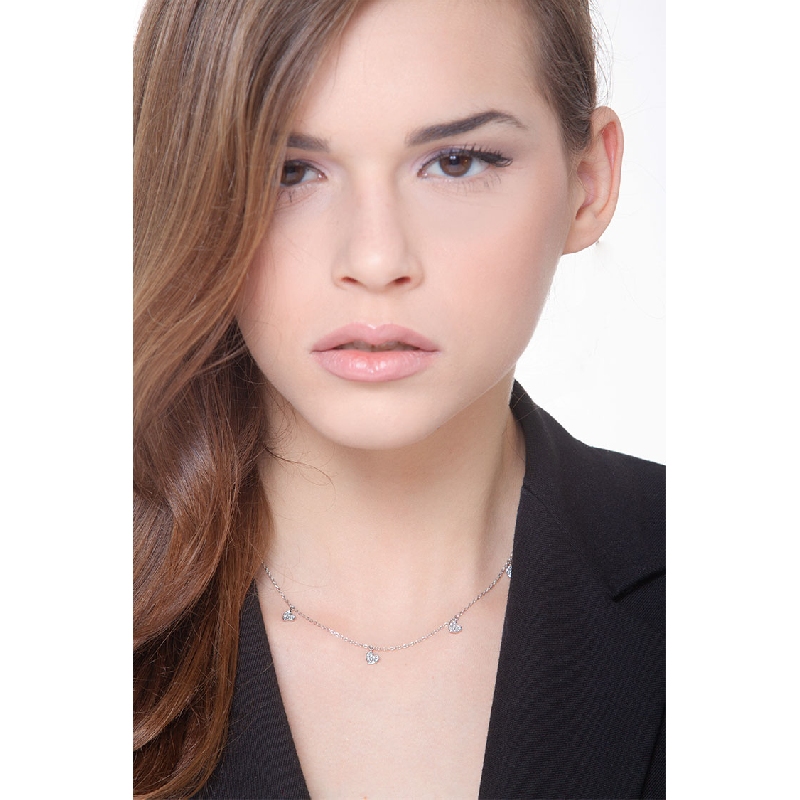 Necklace with heart charms and diamonds