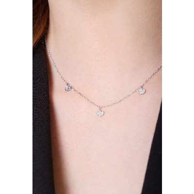 Necklace with heart charms and diamonds
