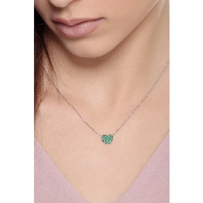 Heart pendant with dark daws and emeralds