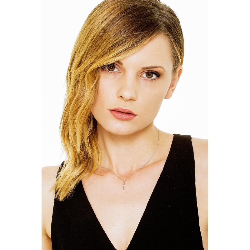 Cross pendant with solitaire diamond in 18k white gold