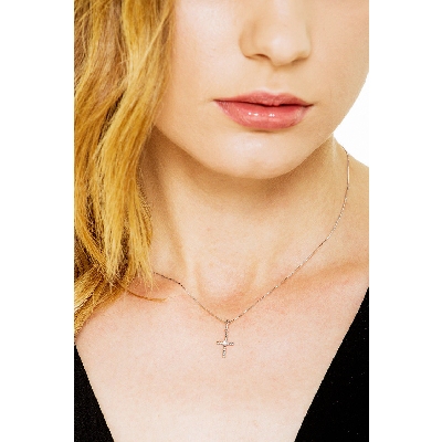 Cross pendant with solitaire diamond in 18k white gold