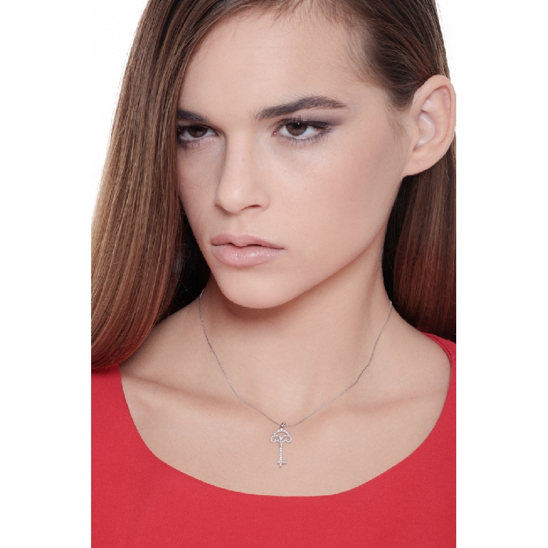 Key pendant with round cut diamonds in 18k white gold