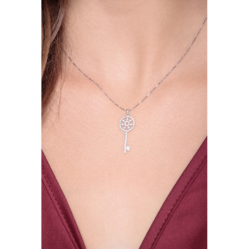 Fancy key pendant with diamonds in 18k white gold
