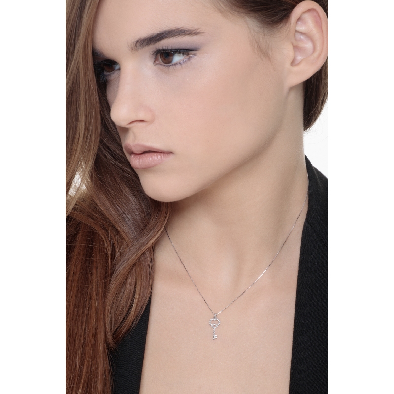 Fancy key pendant with diamonds