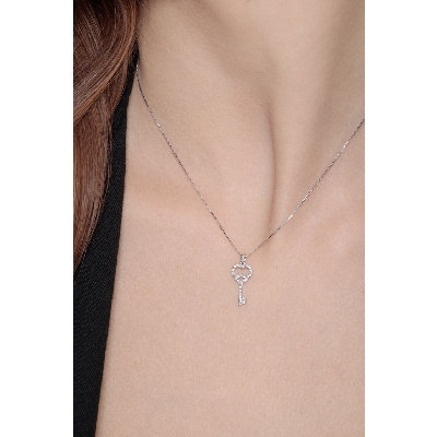 Fancy key pendant with diamonds