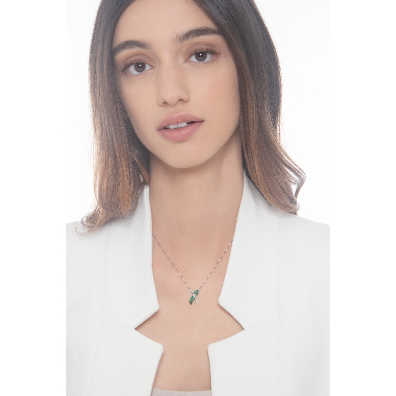 Necklace with fancy twisted pendant with emeralds and diamonds