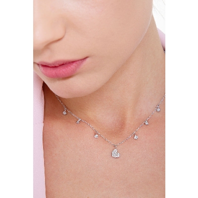Necklace with 6 round cut diamonds and a heart pendant with diamonds