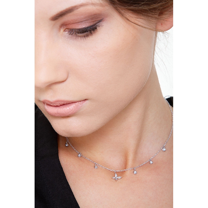 Necklace with 6 round cut diamonds and a diamond butterfly pendant 