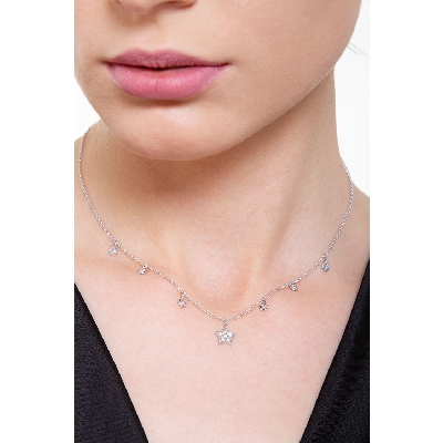 Necklace with a diamond star pendant and diamond charms