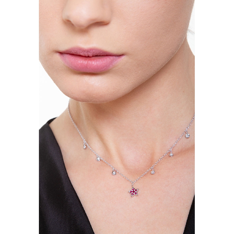 Necklace with 6 round cut diamonds and a star pendant with rubies