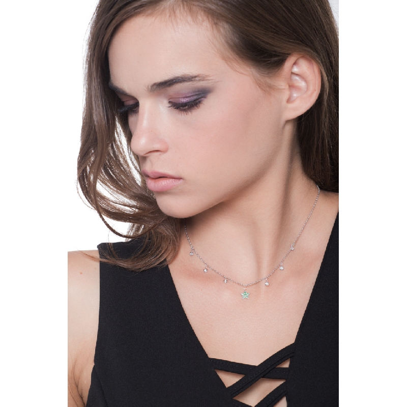 Necklace with 6 round cut diamonds and a star pendant with emeralds