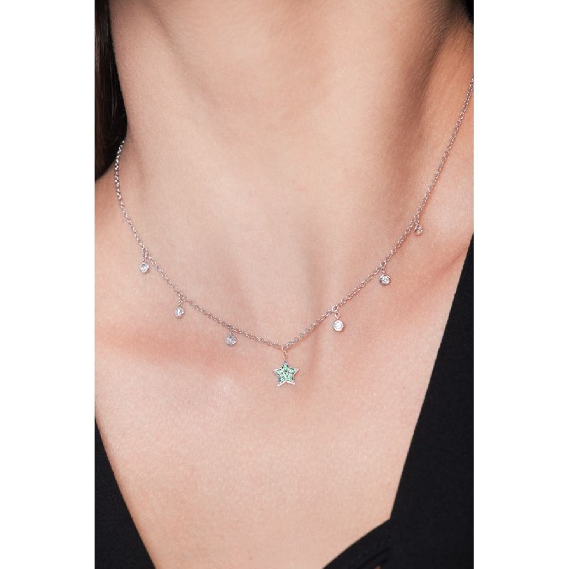 Necklace with 6 round cut diamonds and a star pendant with emeralds