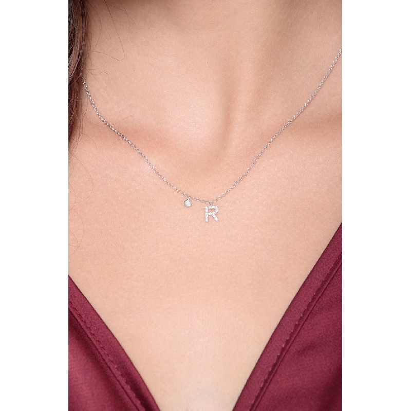 Letter R pendant with diamonds and a little solitaire  