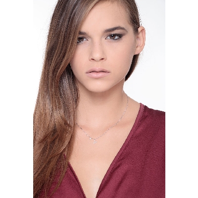 Letter V pendant with diamonds and a little solitaire  