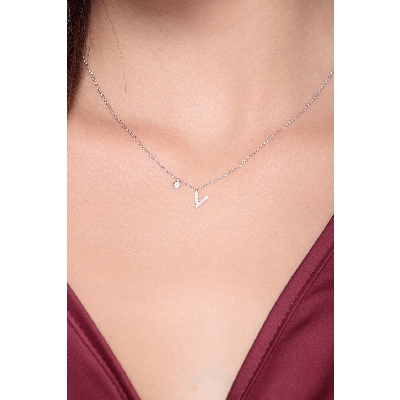 Letter V pendant with diamonds and a little solitaire  