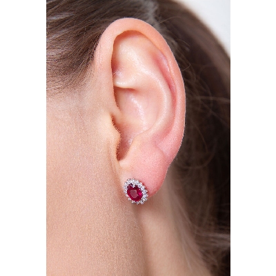 18k white gold halo stud earrings with rubies oval cut and diamonds 