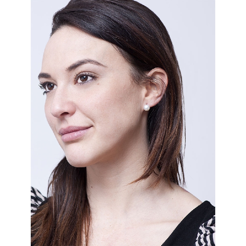 Orecchini a lobo in oro bianco 18k con perla naturale coltivata