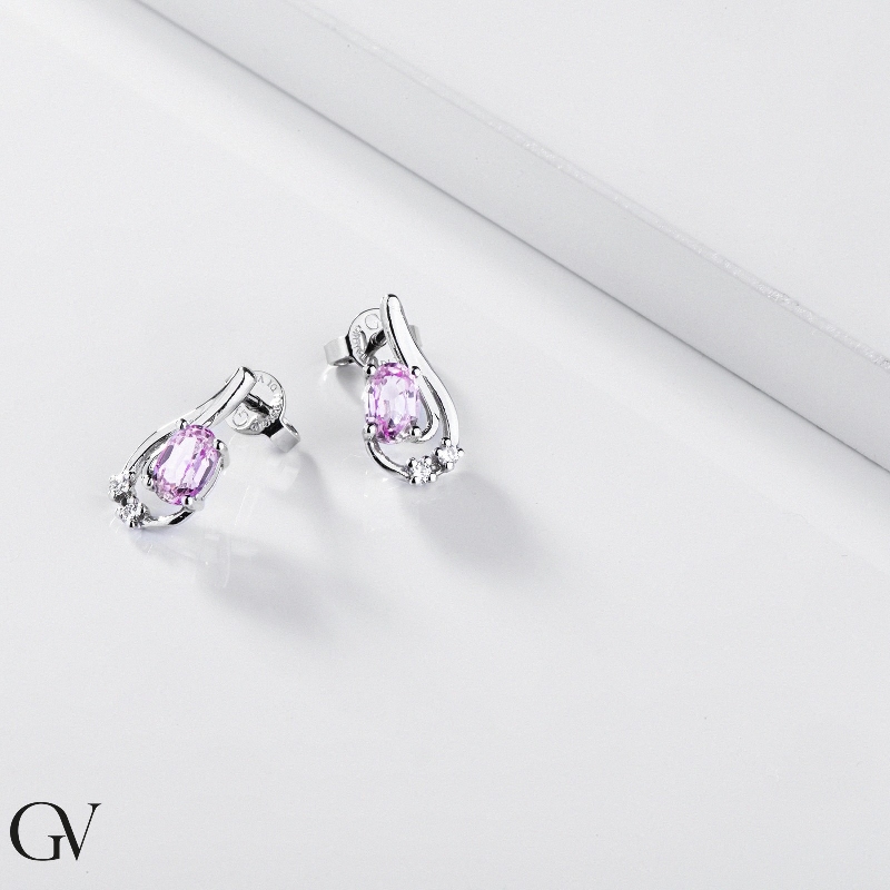 18k white gold earrings with oval cut pink sapphires and diamonds