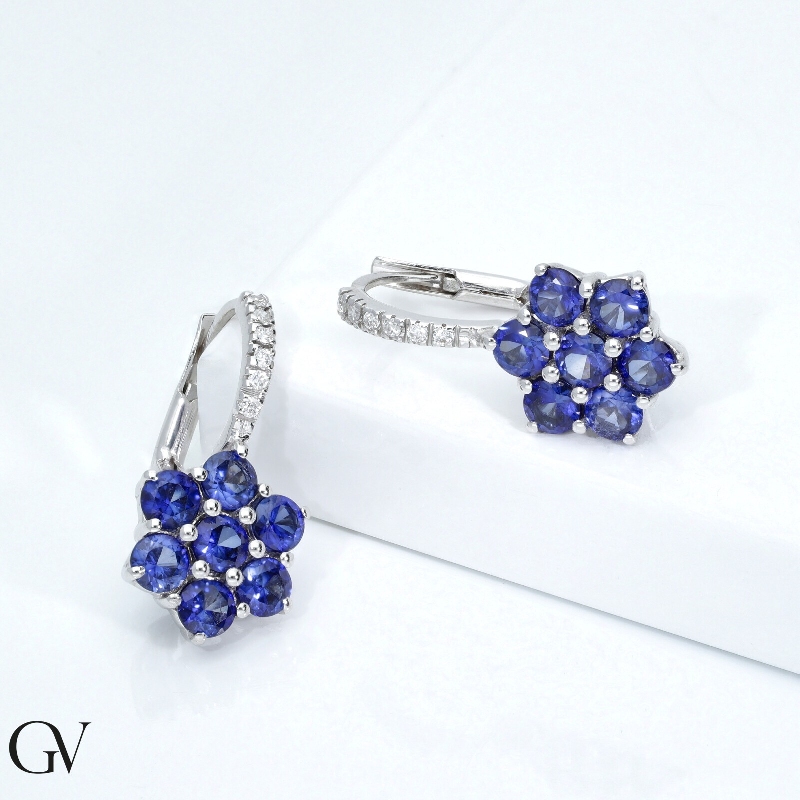 18k white gold earrings with blue sapphires and diamonds flower shaped