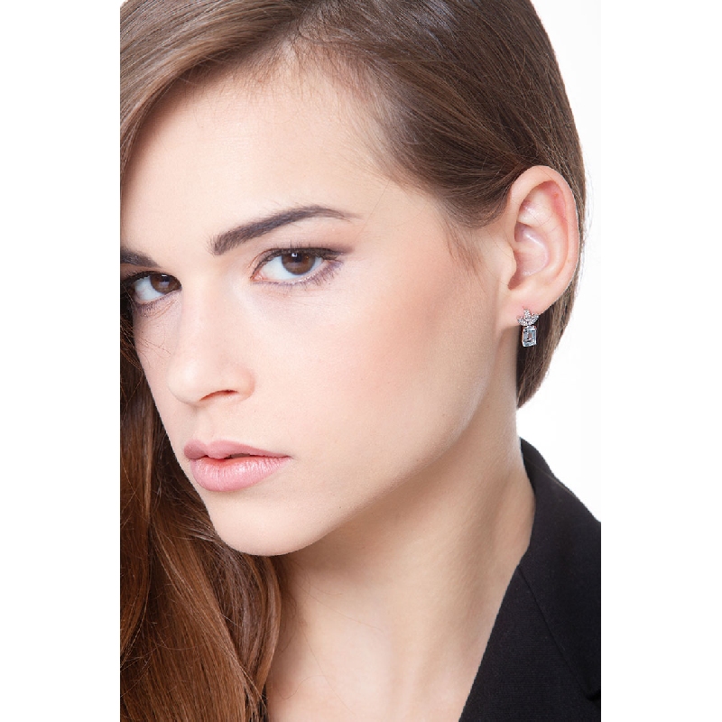 Fancy earrings with round cut diamonds and aquamarine