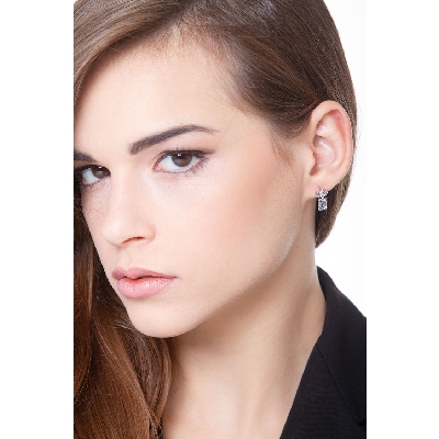 Fancy earrings with round cut diamonds and aquamarine