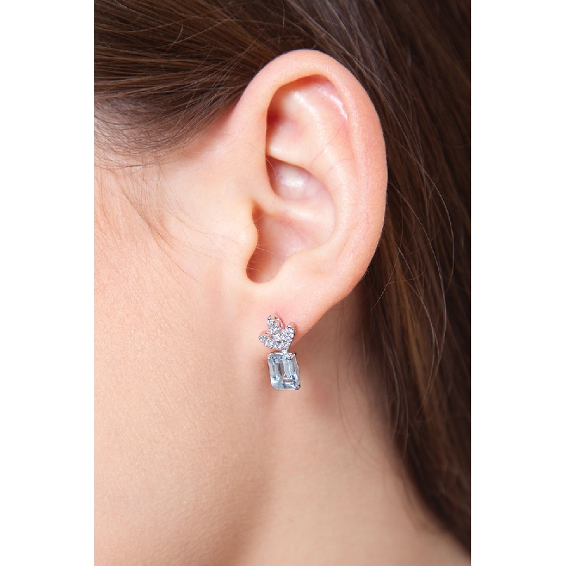 Fancy earrings with round cut diamonds and aquamarine