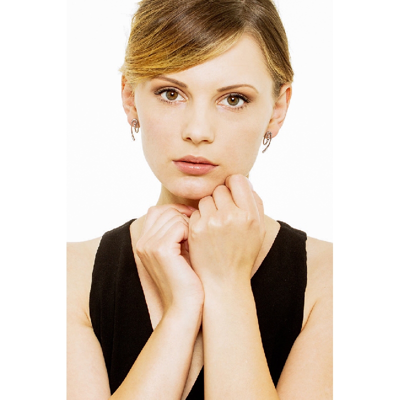 18k white gold spiral earrings with round cut diamonds