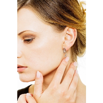 18k white gold spiral earrings with round cut diamonds