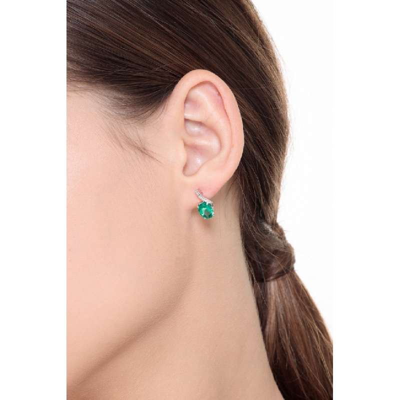 18k white gold fancy earrings with emeralds and round cut diamonds