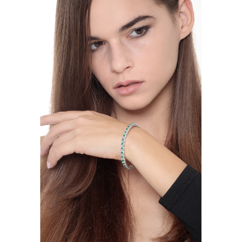 Elastic bracelet with diamonds and emeralds