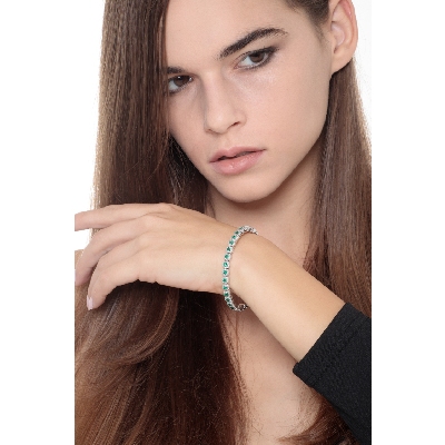 Elastic bracelet with diamonds and emeralds