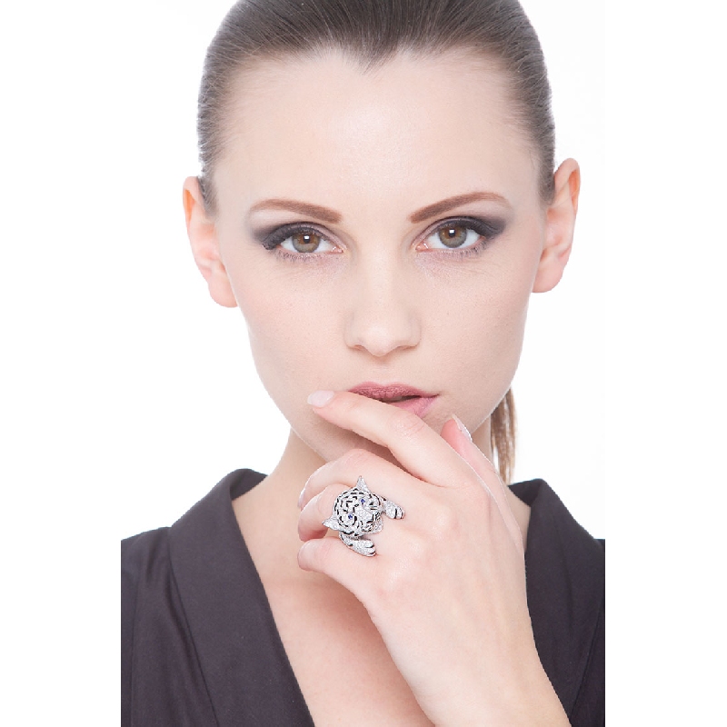 18k white gold tiger ring with diamonds and blue sapphires 