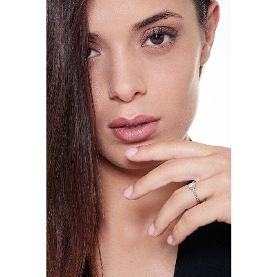 4 claw solitaire ring with a 0,20 ct diamond and regular shank