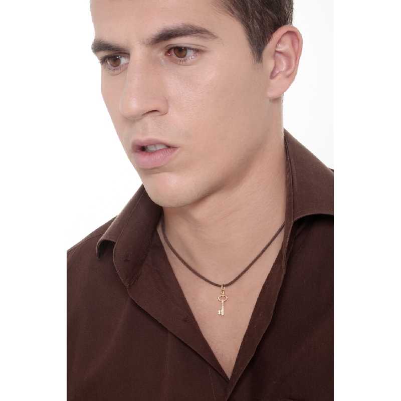 Key pendant in 18k yellow gold