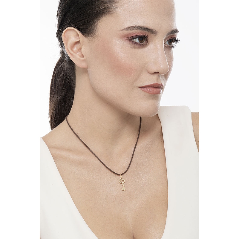 Key pendant in 18k yellow gold