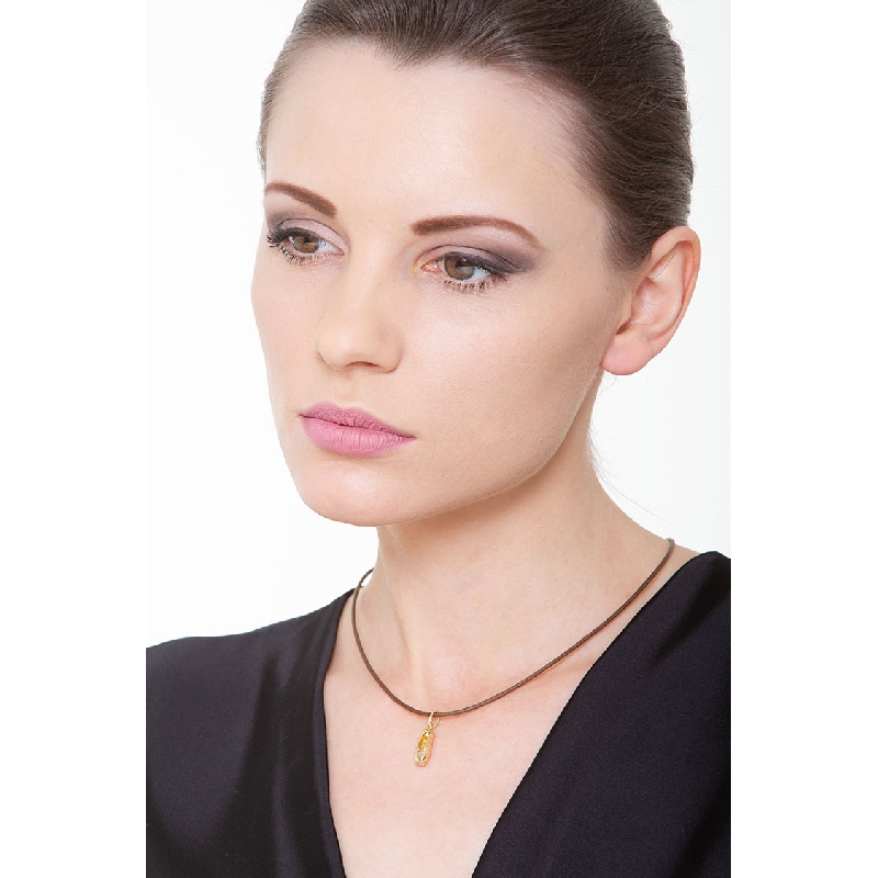 Dancing shoe in 18k yellow gold