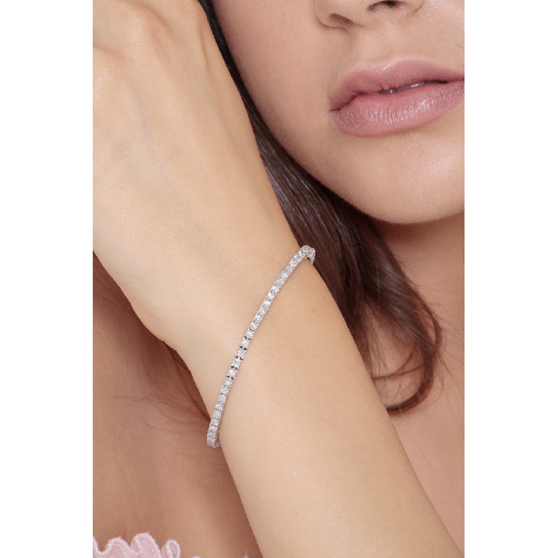 Bracciale Tennis lineare modello filo in oro Bianco 18k con Diamanti 