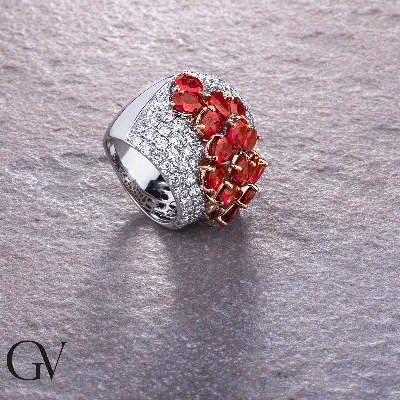 18k white gold band ring with rubies pear cut and diamonds 